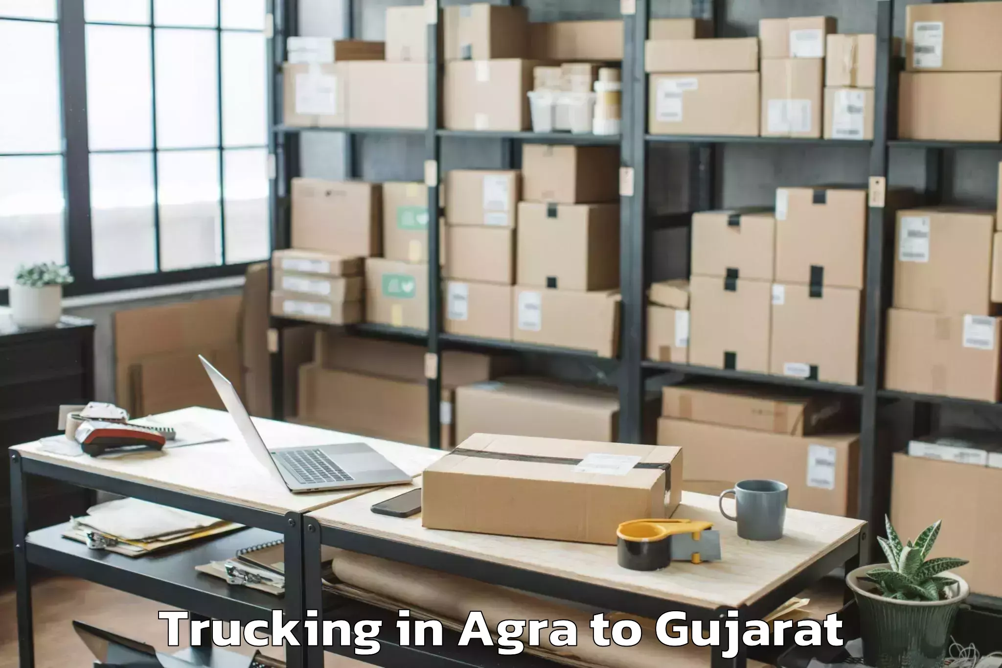 Book Agra to Jambughoda Trucking Online